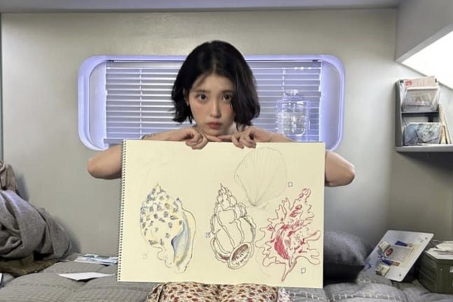 IU Drops Emotional Teasers for New Single “From This Star,” Featuring a Surprise Two-Shot with Chilean Actor Jorge López